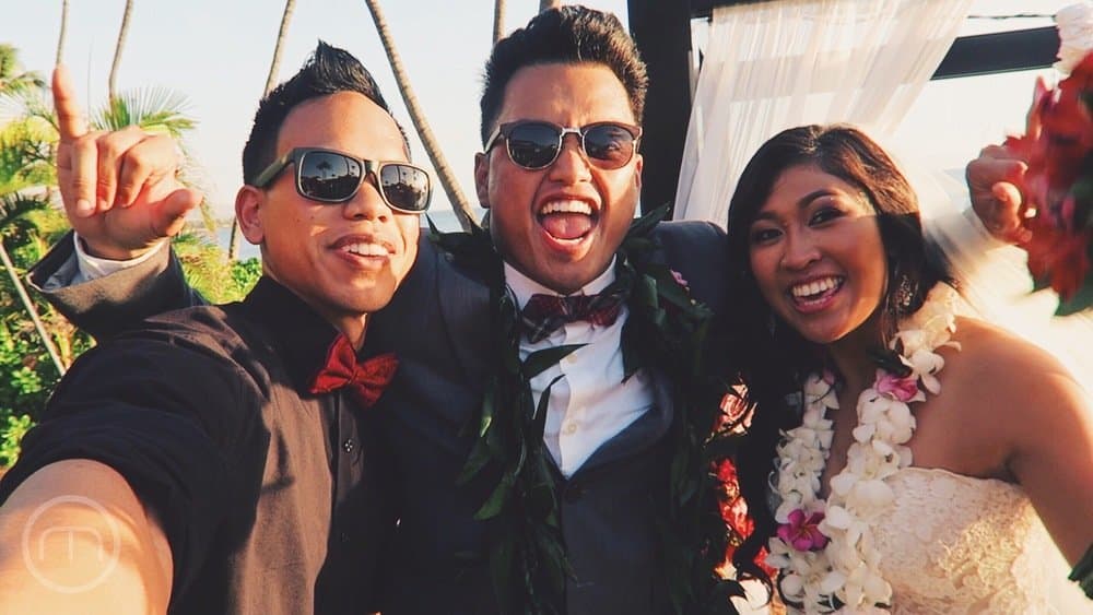 DJ MOJOE with a couple at their Maui destination wedding
